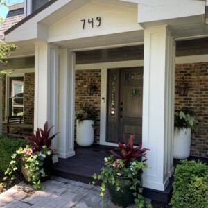 front porch with summer containers