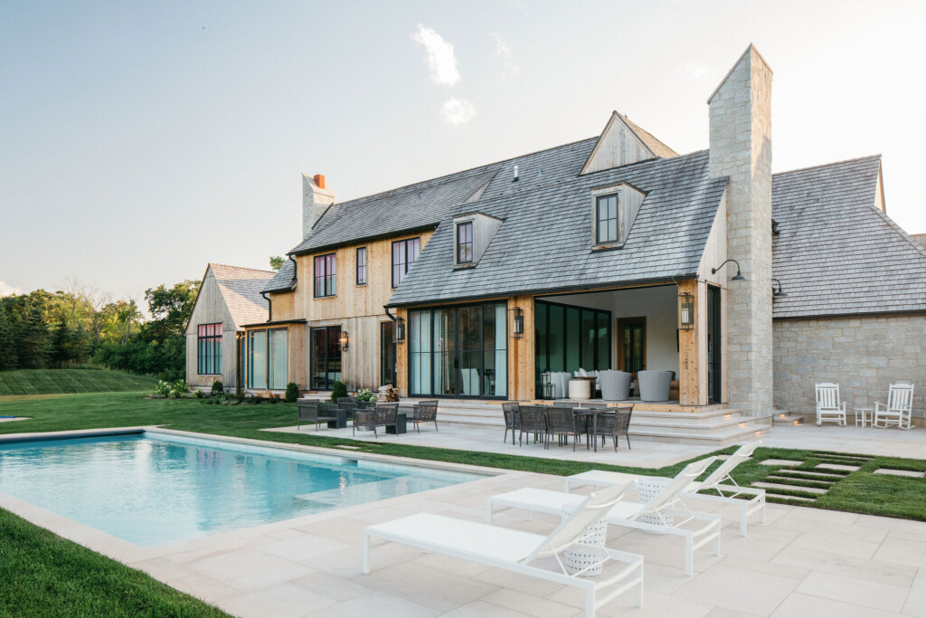 swimming pool and side view of the home