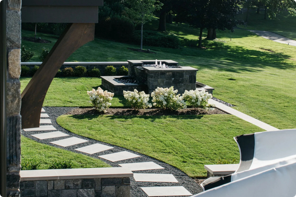 Image of a landscape with a path and water feature